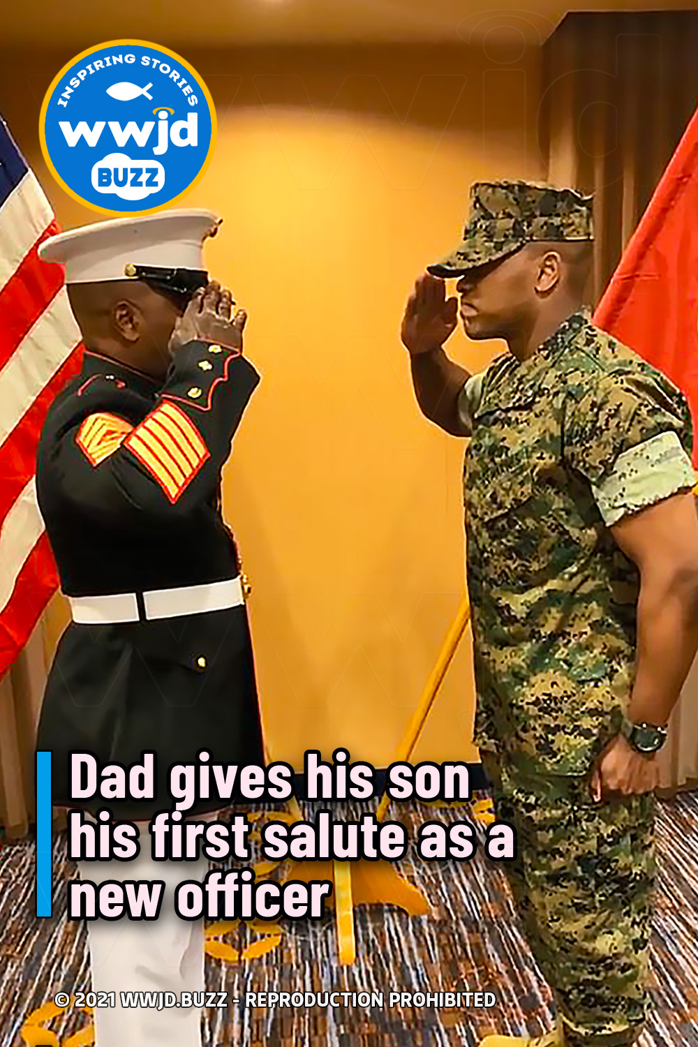 Dad gives his son his first salute as a new officer
