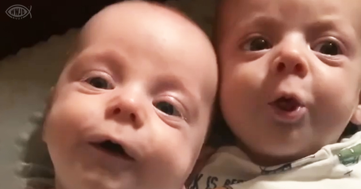 adorable smiling infant twins