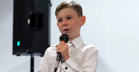 9-year-old boy giving a speech at his older sister's wedding
